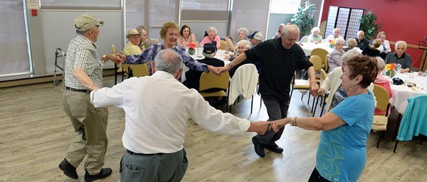 Holocaust victims dance at the "Reaching Out" socialization program of Jewish Child and Family Service of Winnipeg, Canada which is supported by a Claims Conference grant.
